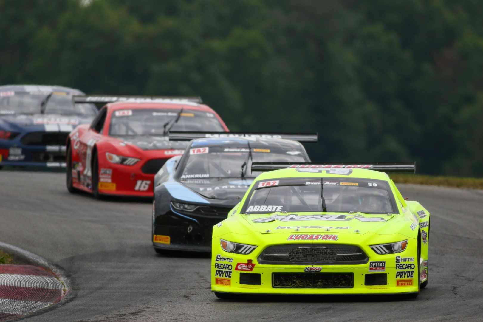 Michele Abbate leading a pack of TA2 cars at Mid Ohio